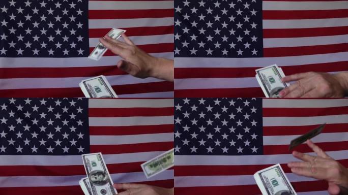 美国国旗背景下的美元下跌。慢动作。