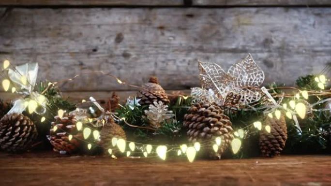 木制背景上圣诞树装饰上的灯光动画