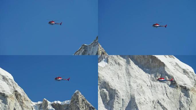 救援直升机在阳光下在雪山上空的蓝天上高飞