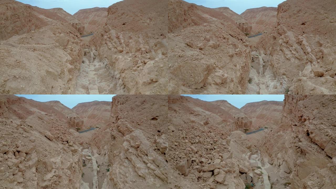 沙漠山脉的岩石峡谷构造和道路结构
