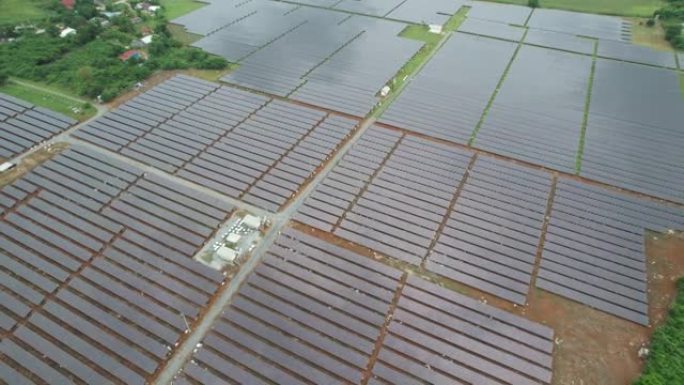 空中无人机飞行飞越太阳能电池板领域泰国可再生绿色替代能源概念