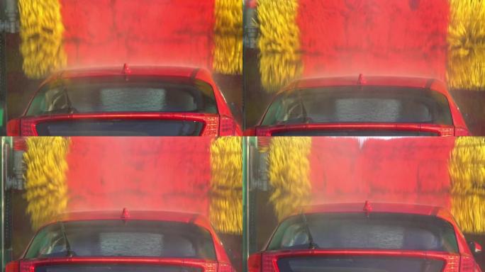 汽车通过自动洗衣机的慢速运动。清洗车