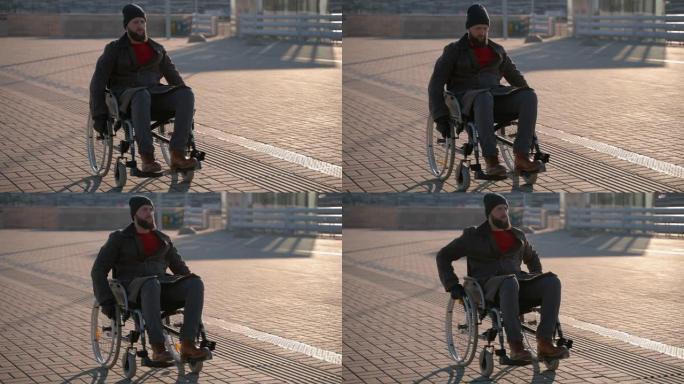 年轻人正在使用手动轮椅在街上移动，残疾人