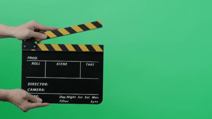 电影拍板。好莱坞导演电影《石板》。摄制组在录像中握住并拍拍胶片。用于剪切动作或视觉效果和场景道具。电