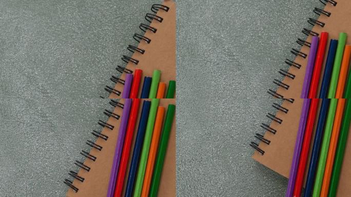 彩色铅笔和画板在桌面上的动画