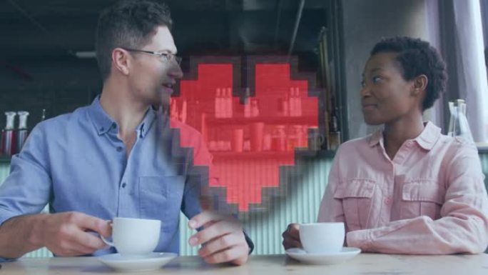 快乐的多元化夫妇在咖啡馆喝咖啡的数字心脏动画