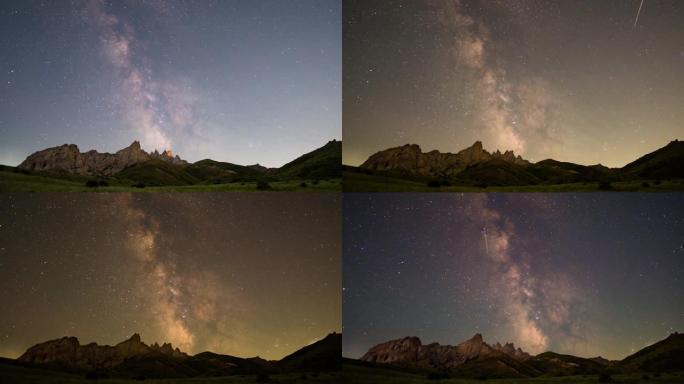 山脉背景下夜空中银河系的运动。