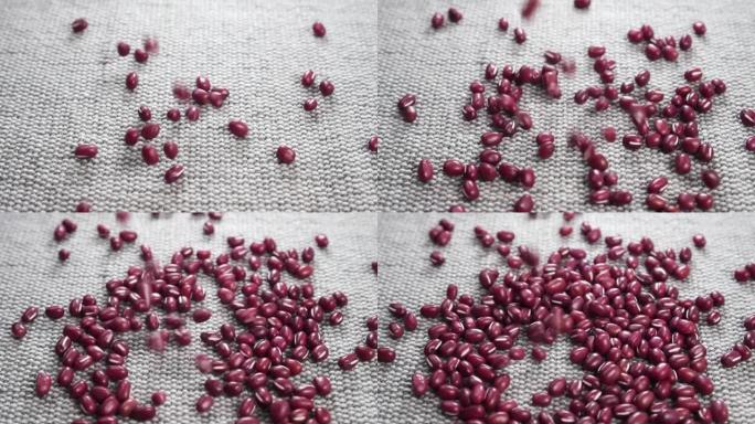 红小豆或小豆。在粗糙的黄麻乡村布上掉落未煮熟的有机豆类谷物
