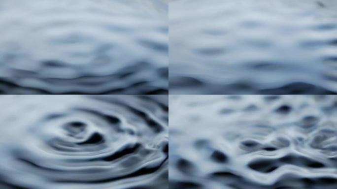 共振。白色和黑色金属的宏观，视觉效果看起来像液态金属。旋转黑水液体。不是3D抽象背景。波浪形反射面。