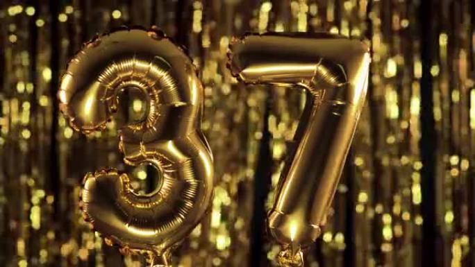 金色数字37三十七是由黄色背景上的充气气球制成的。一组完整的数字。生日、周年纪念日、日期概念