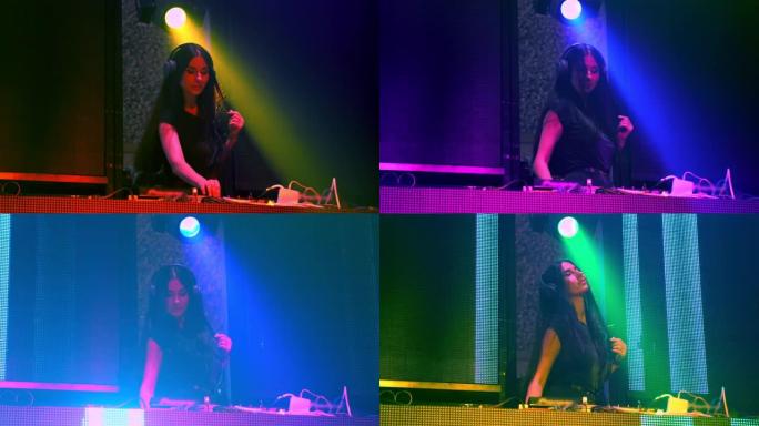 迪斯科夜总会舞台上的DJ混合技术音乐节拍