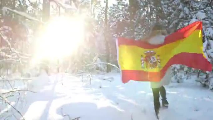 冬季光环中带有西班牙国旗的女孩