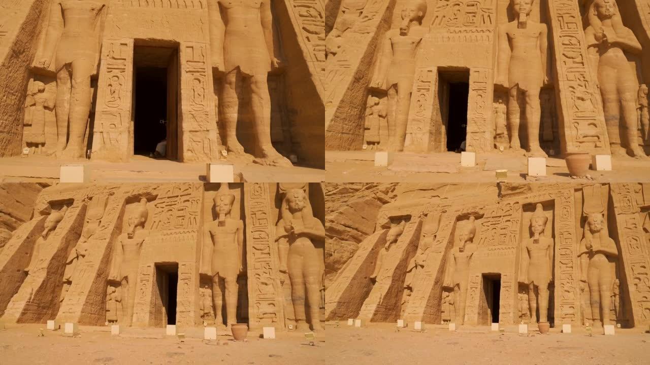 走到nefertari神庙里面的门旁边的阿布辛贝神庙在埃及南部努比亚靠近纳赛尔湖。拉美西斯二世法老庙