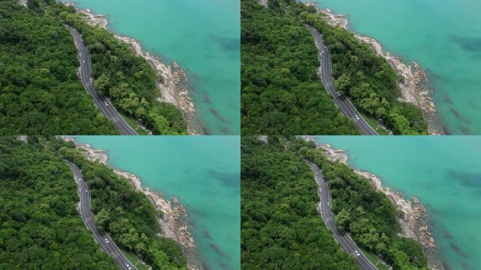 泰国那空西塔玛拉特白天椰树和大洋之间的道路鸟瞰图
