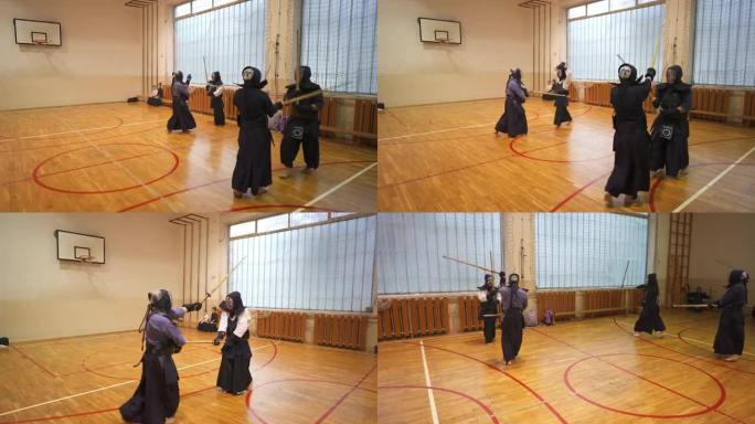 武术学生，剑道训练期间练习防御和攻击