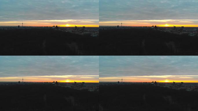 日出时在柏林蒂尔加滕上空的无人机镜头
