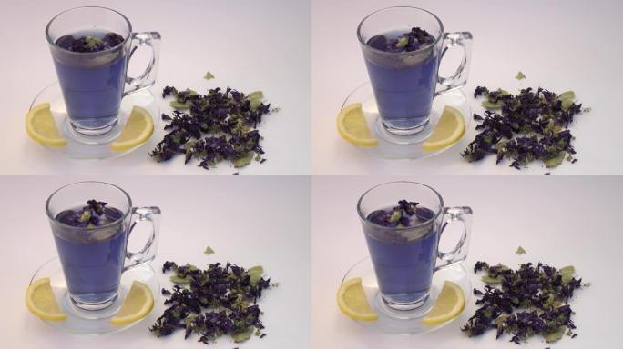 一杯带有蝴蝶花序的茶-豌豆花，蓝茶