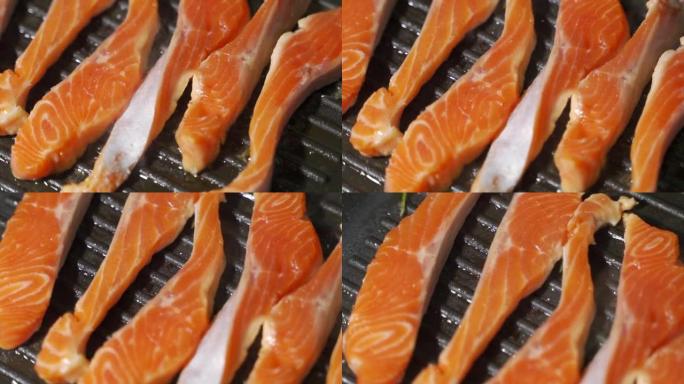 自制鱼粉。一块鲑鱼或鳟鱼片在烤盘上油炸。