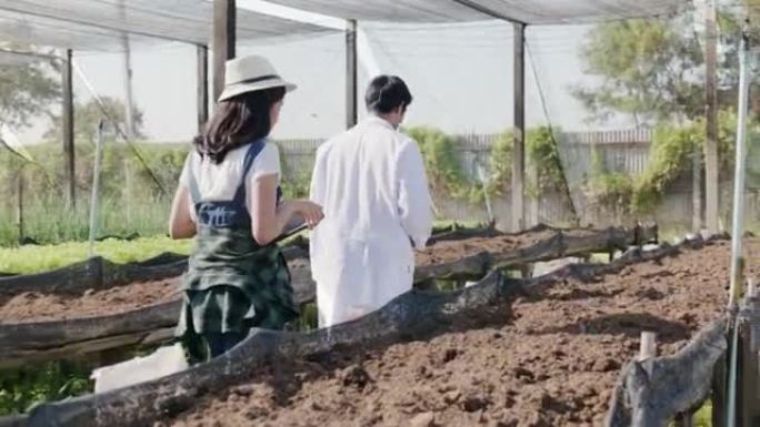 20-30岁的亚裔农民和科学家。谈论在自己的花园里种植有机蔬菜作为自己的饭菜，并将其用作原料在她的餐