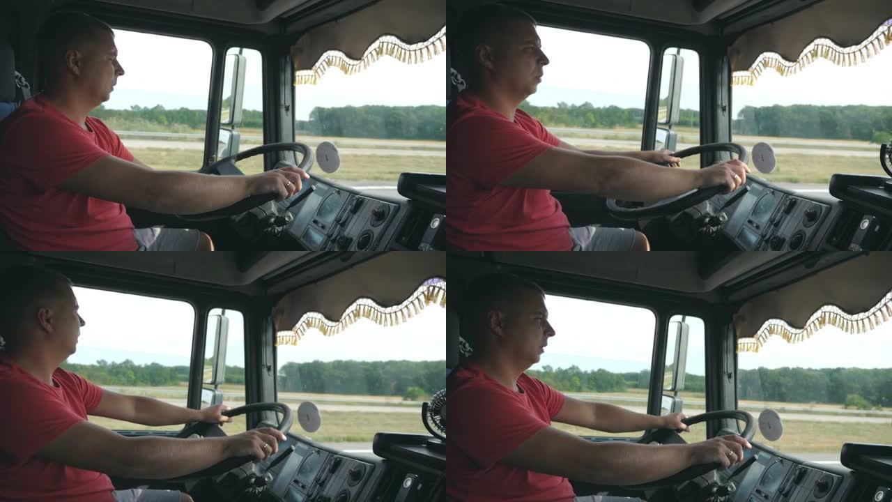 卡车司机手握方向盘，控制卡车驶向目的地。男子在乡下驾驶汽车。卡车司机在乡间道行驶。物流运输概念。
