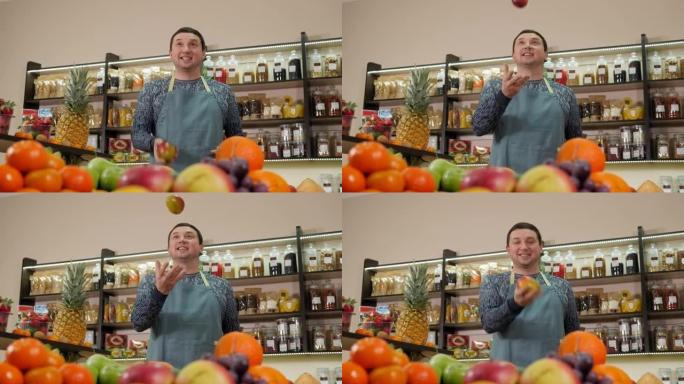 一个拿着芒果的杂货店店员的肖像。