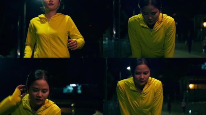 美丽的年轻亚洲女跑步者晚上在城市进行激烈的跑步运动后筋疲力尽地休息。