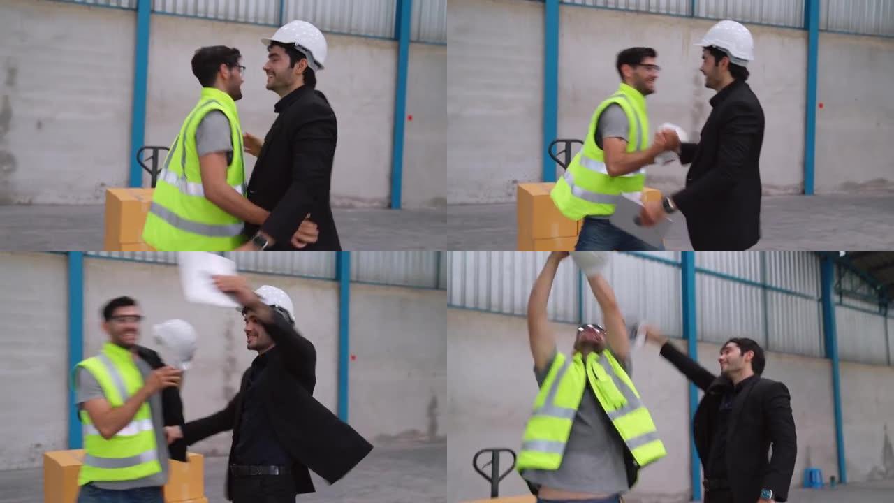 有趣的工厂工人在工厂跳舞