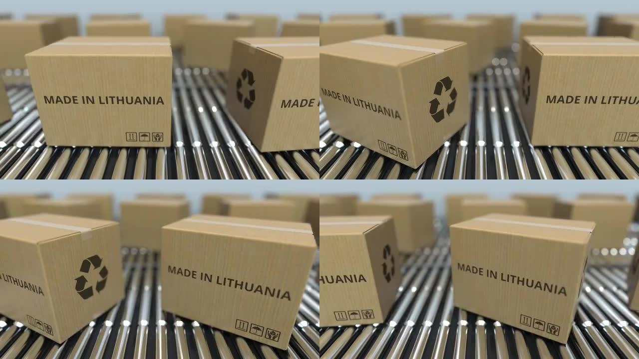 滚筒输送机上带有立陶宛制造文本的盒子