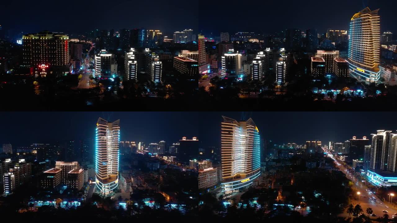 夜间照明海南岛三亚市航空全景4k中国