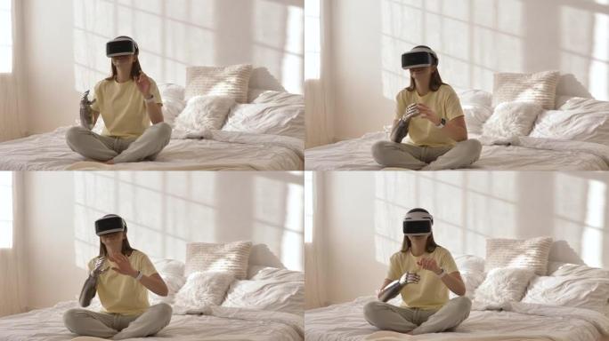 有仿生手臂和虚拟现实耳机的女士玩游戏