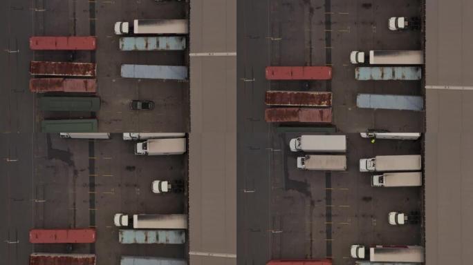 货港物流停车场停放的卡车和集装箱的俯视图