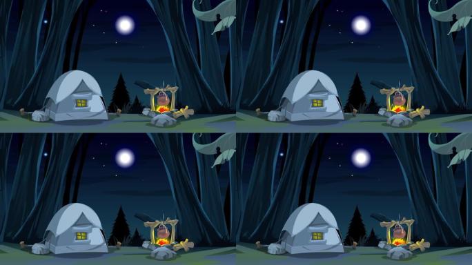 晚上用篝火在森林里露营帐篷。