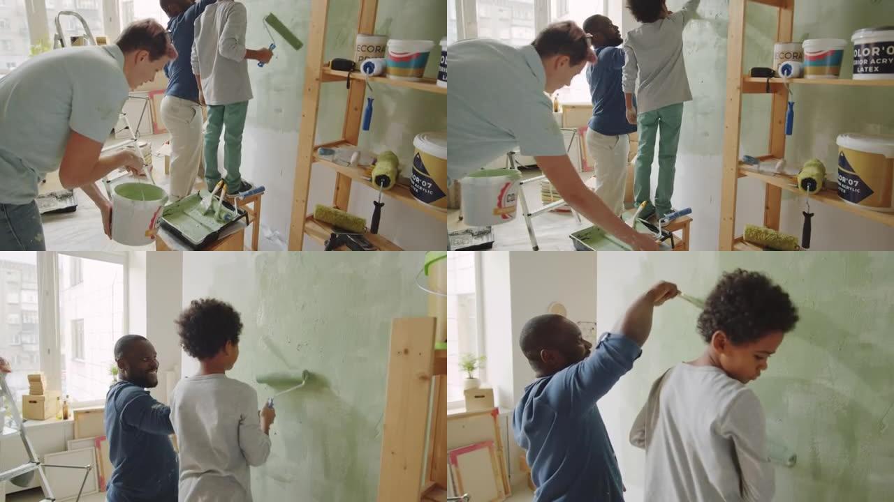 在家庭装修期间，多样化的家庭将墙壁画在一起