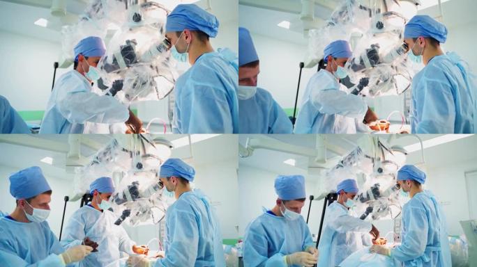 现代诊所医服医生的团队合作。一组医生用显微镜进行显微外科手术。神经外科概念。