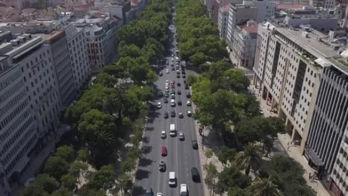 阳光明媚的日子里斯本城市景观交通街全景4k葡萄牙