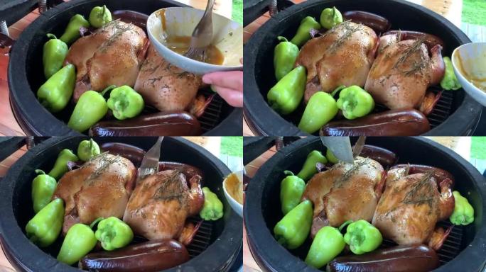 鸭子在烤鸡蛋中烘烤，鸭子撒上香草调味料，在蔬菜周围烘烤，茄子，青椒