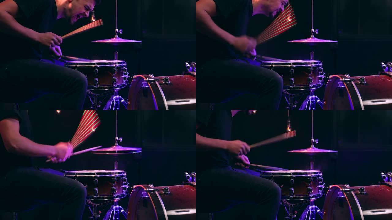 男人学习打鼓。