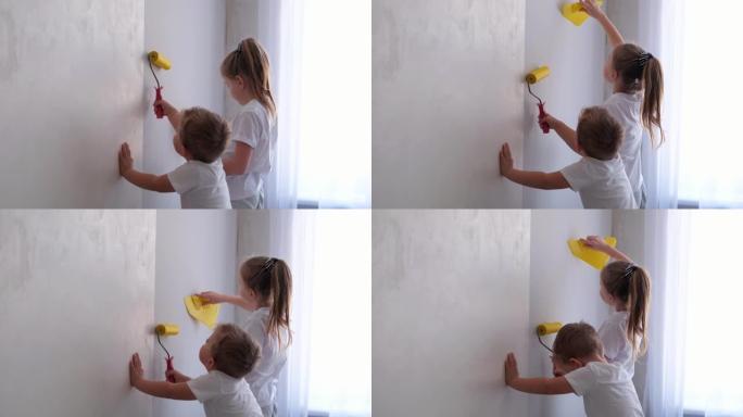 孩子们用滚轮抚平墙上的墙纸。兄弟姐妹给父母做墙纸。公寓装修。