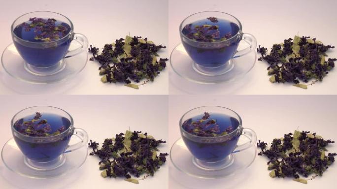 一杯带有蝴蝶花序的茶-豌豆花，蓝茶