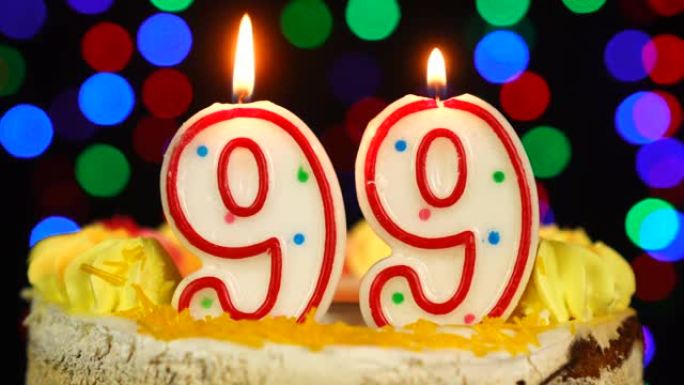 99号生日快乐蛋糕Witg燃烧蜡烛礼帽。