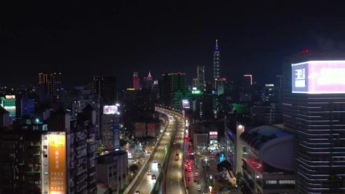 夜间照明台北市中心交通街公路十字路口空中全景4k台湾