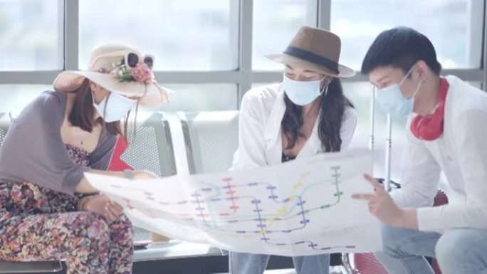 women passenger with friend wearing mask at airpor