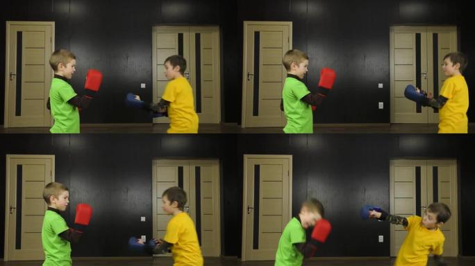 男孩手臂上有红色和蓝色的护垫，穿着黄色和绿色的t恤，练习配对练习