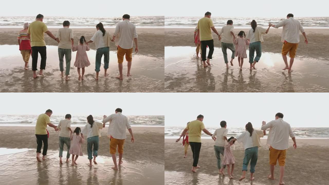团结家庭之旅步行到海滩-股票视频