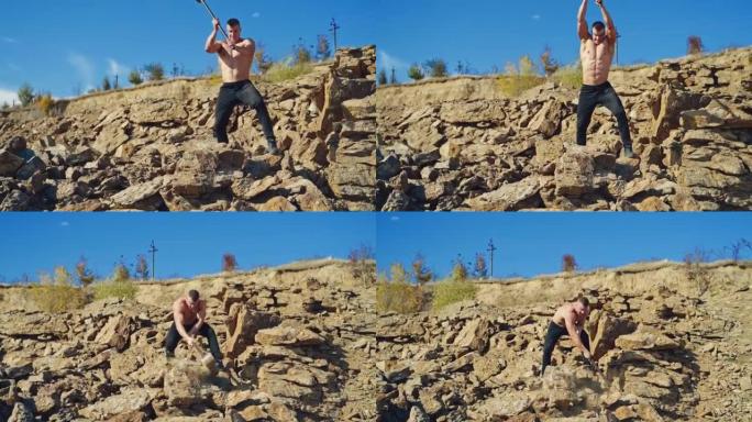 肌肉健美运动员正在山上用钢锤训练。没有衬衫的强壮运动员在户外用金属工具打碎石头。慢动作。