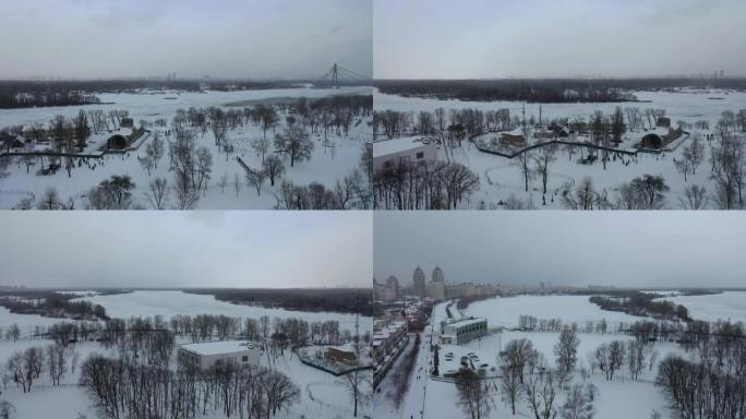 欧洲，基辅，乌克兰-2021年2月: 鸟瞰Obolonskaya堤防和第聂伯河。公寓楼，房地产。纳塔