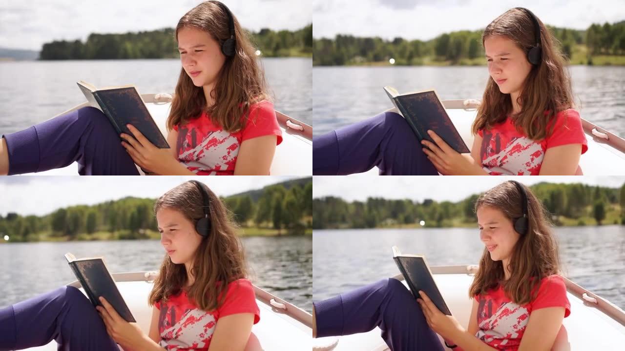 十几岁的女孩在船上读书