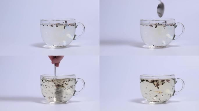 在透明杯中冲泡干茶叶