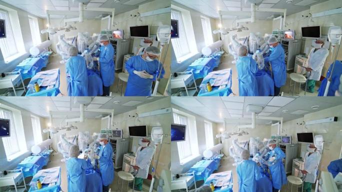 未来主义手术室。具有微创手术系统的机器人手术。一群医生控制着医院医疗机器人的工作。
