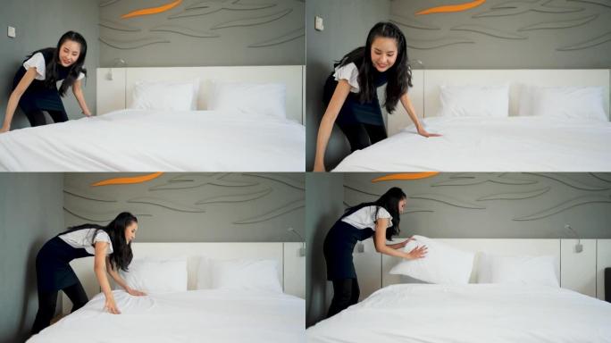 年轻的女仆，戴着医用口罩，在酒店房间的床上换床单。